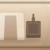 Warm editorial scene of a spray tan pop-up booth with an extractor ventilation unit pulling soft mist — no brand logos